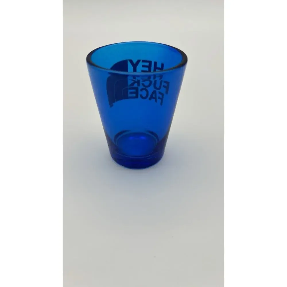 Hey F*** Face Shot Glass. Looks Like North face Logo. VG Condition.